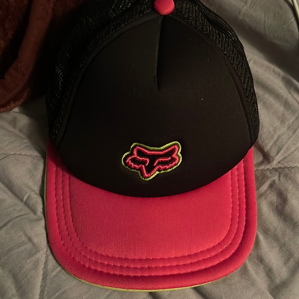 Pink, green and black fox riding company trucker hat